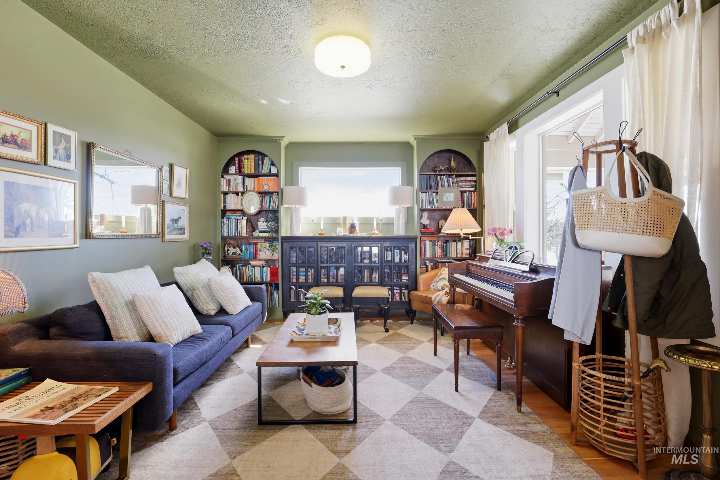 725 Elm Street Potlatch, ID 83855 - Photo 7 of 50 Living area featuring a textured ceiling and light wood-style floors