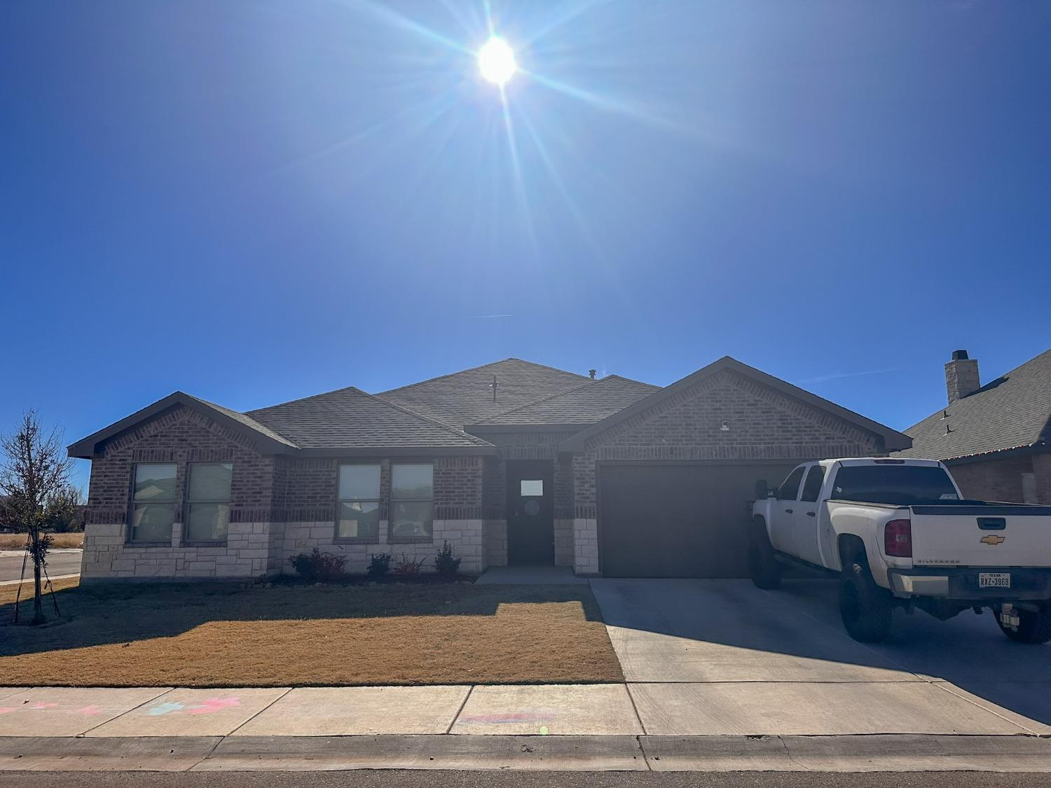 323 Ranger Street Wolfforth, TX 79382 - Photo 1 of 48 a front view of a house with a yard