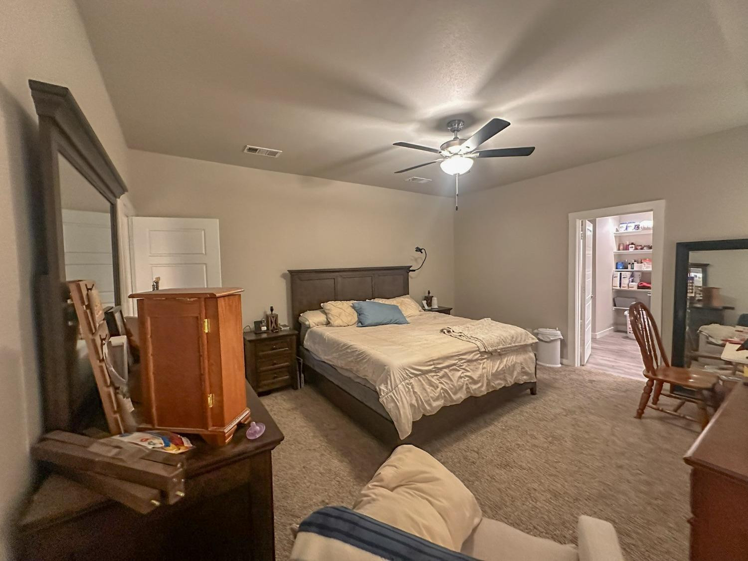 323 Ranger Street Wolfforth, TX 79382 - Photo 16 of 48 a bedroom with a bed and a desk