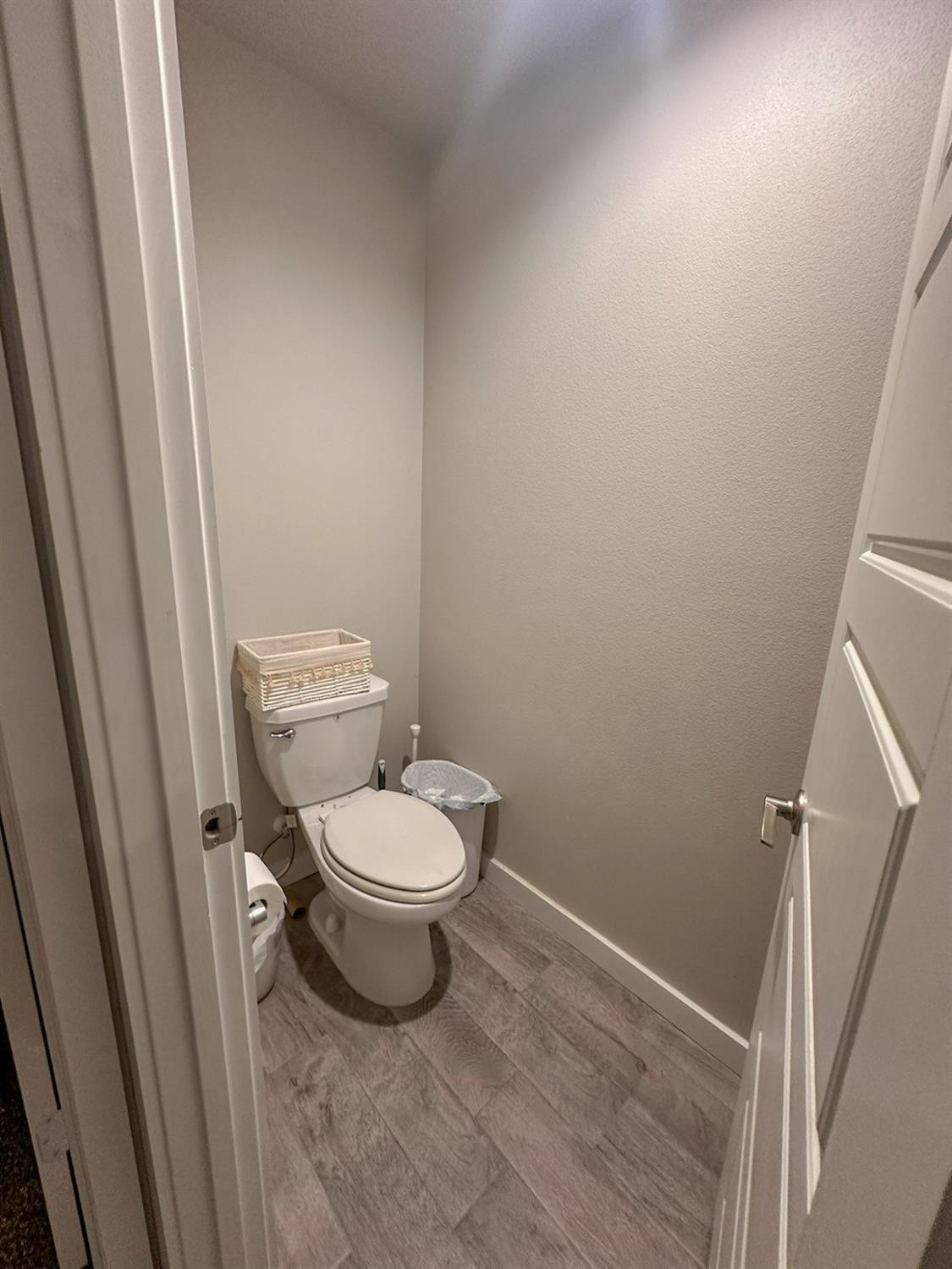 323 Ranger Street Wolfforth, TX 79382 - Photo 24 of 48 a white toilet sitting next to a sink