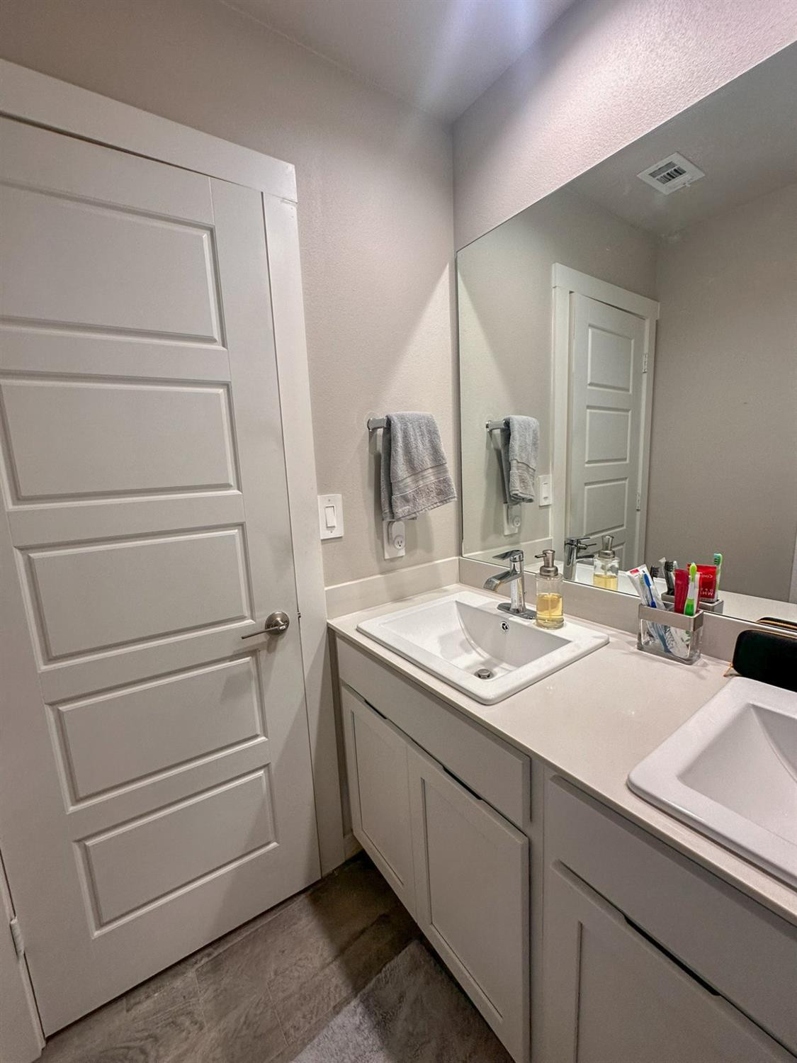 323 Ranger Street Wolfforth, TX 79382 - Photo 32 of 48 a bathroom with a sink and a mirror