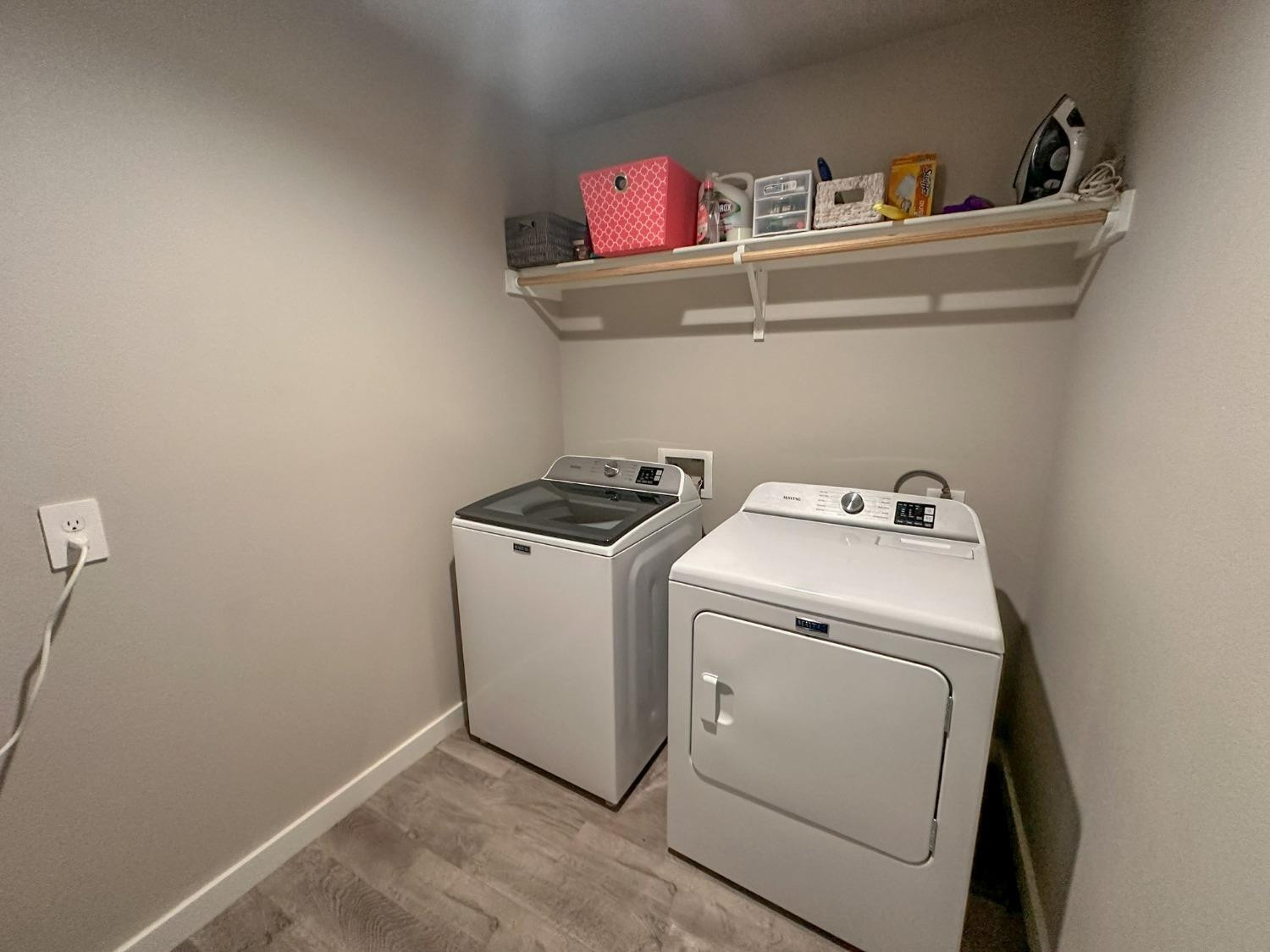 323 Ranger Street Wolfforth, TX 79382 - Photo 41 of 48 a utility room with dryer and washer
