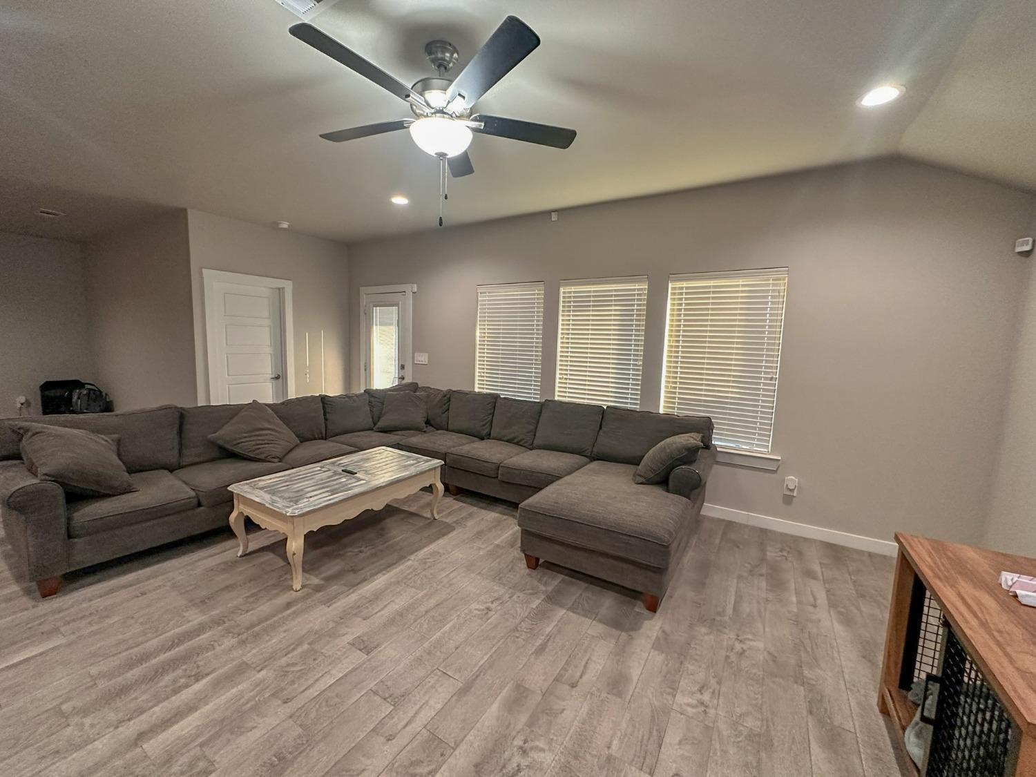 323 Ranger Street Wolfforth, TX 79382 - Photo 5 of 48 a living room with furniture and a wooden floor