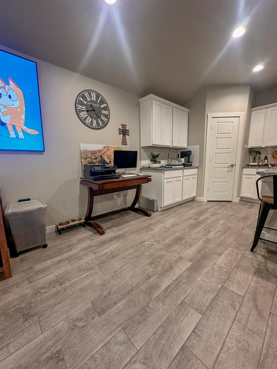 323 Ranger Street Wolfforth, TX 79382 - Photo 8 of 48 a living room with stainless steel appliances furniture a rug and a view of kitchen
