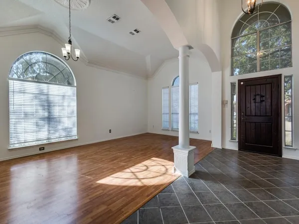 a view of a livingroom with wooden floor