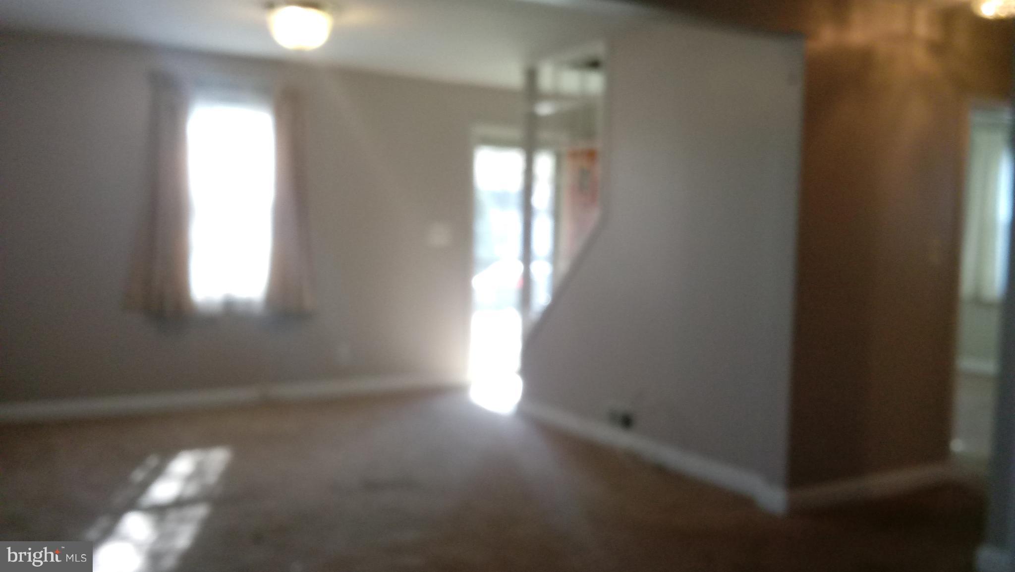 1533 Leslie Road Dundalk, MD 21222 - Photo 5 of 9 a view of empty room with window