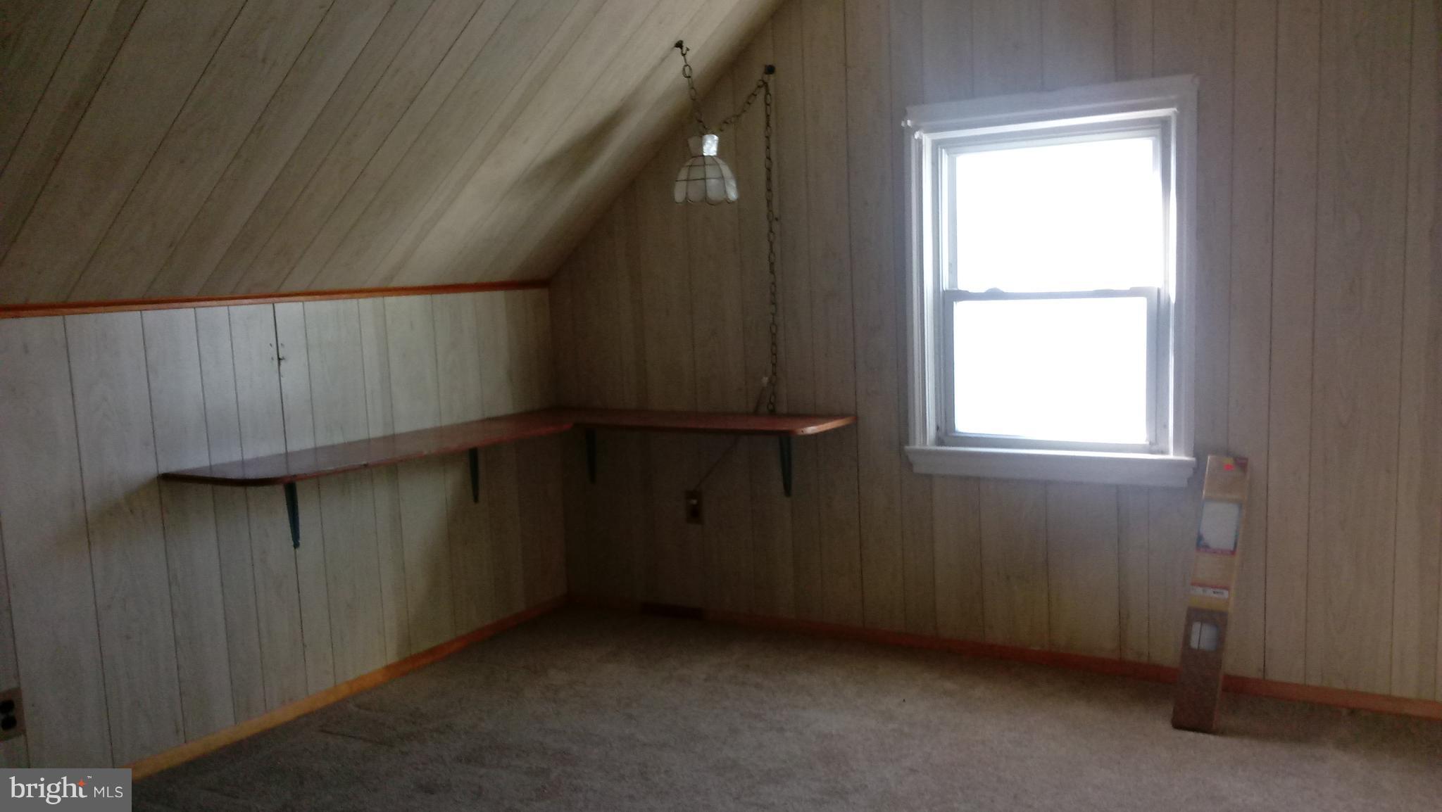 1533 Leslie Road Dundalk, MD 21222 - Photo 7 of 9 a view of an empty room with a window