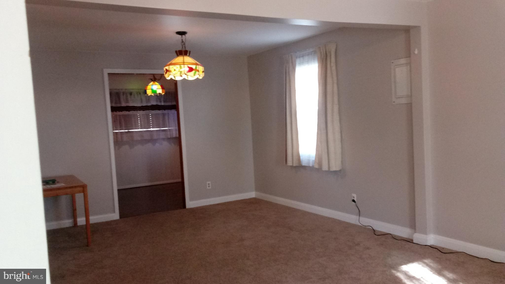 1533 Leslie Road Dundalk, MD 21222 - Photo 9 of 9 a view of an empty room with a window