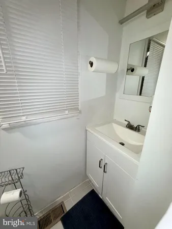 a bathroom with a sink and a vanity