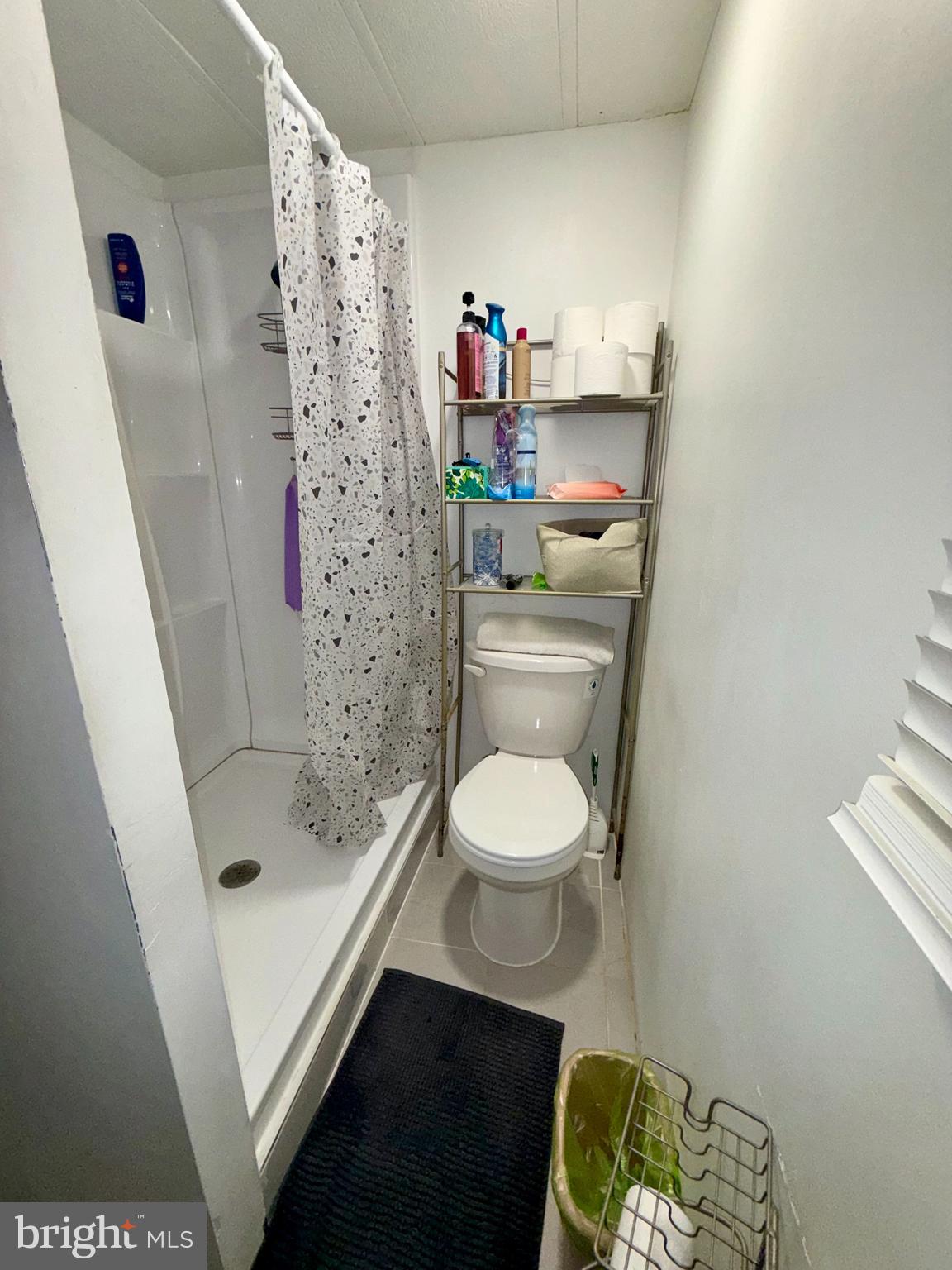 299 Rips Drive Lothian, MD 20711 - Photo 12 of 18 a bathroom with a toilet and a shower