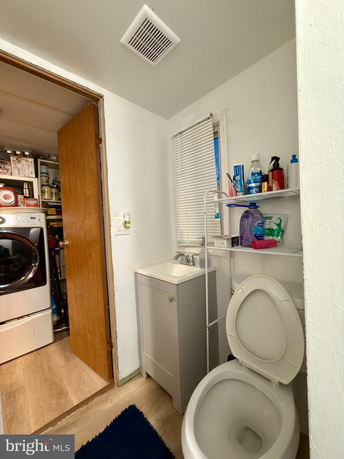 299 Rips Drive Lothian, MD 20711 - Photo 15 of 18 a bathroom with a toilet a sink and a shower