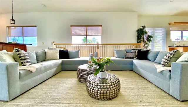 a living room with furniture and a couch