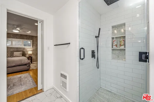 a view of a swimming pool with an outdoor space and seating area