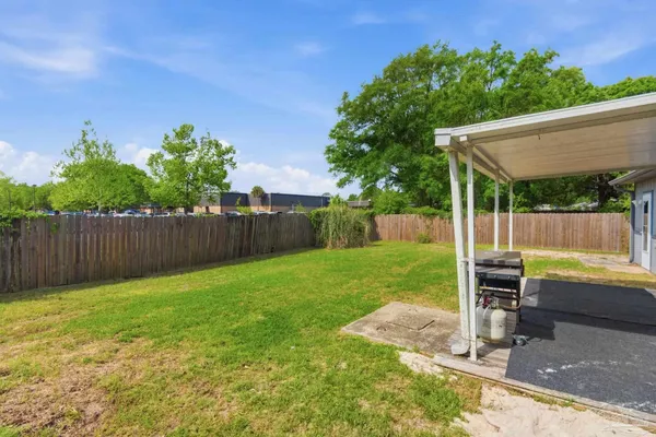 a view of a backyard with a garden