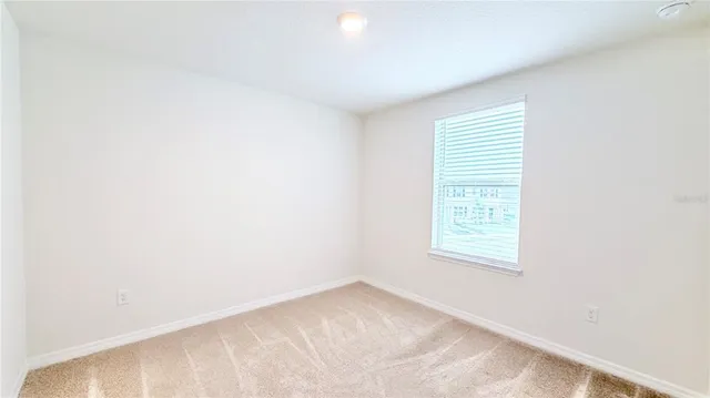 an empty room with a window