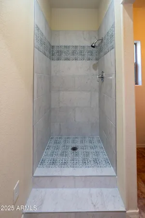 a bathroom with a toilet and a sink