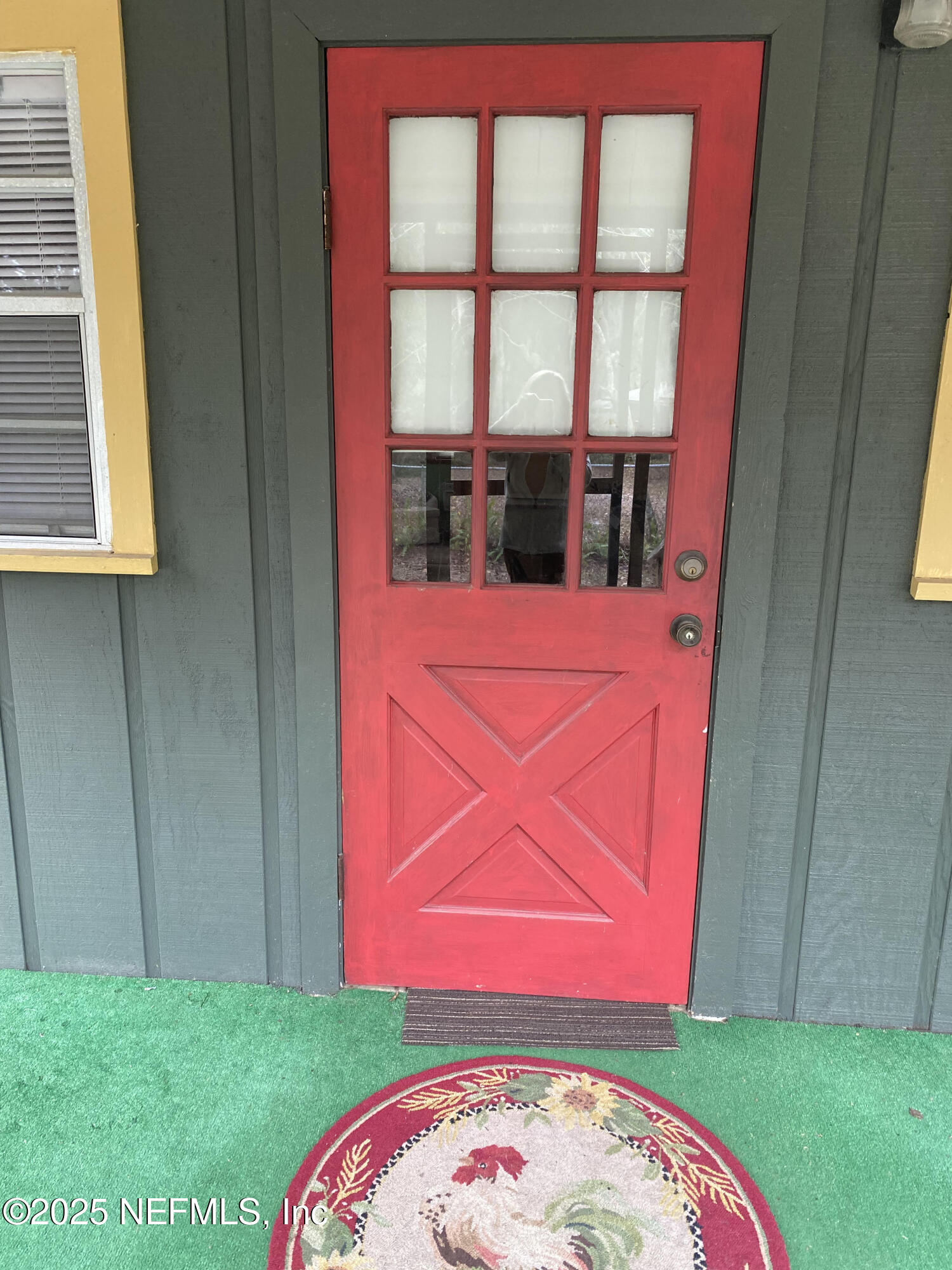 8093 Breezy Point Road East Keystone Heights, FL 32656 - Photo 3 of 35 SCREENED PORCH ON 2ND COTTAGET