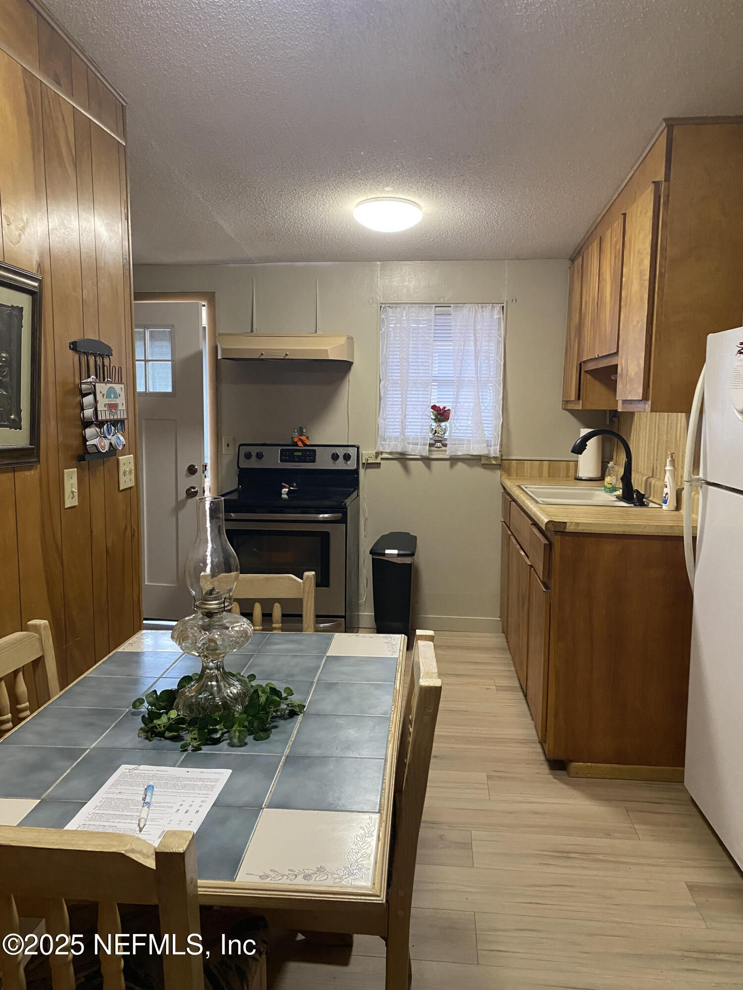 8093 Breezy Point Road East Keystone Heights, FL 32656 - Photo 8 of 35 KITCHEN IN 1ST COTTAGE