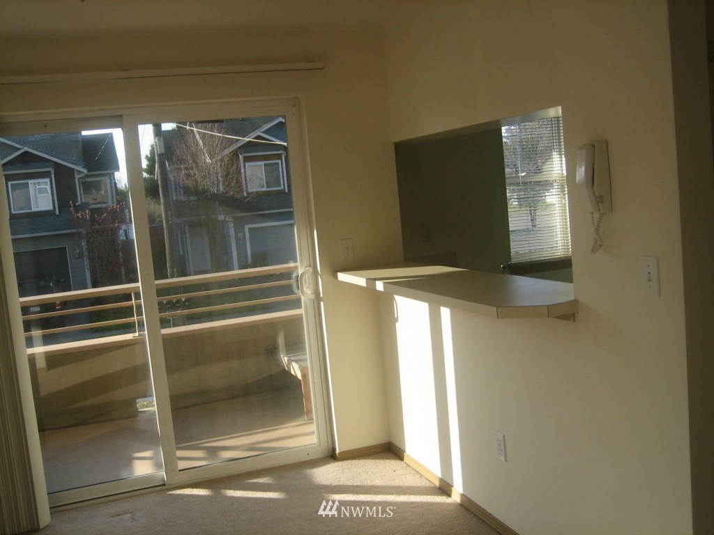 703 North 95th Street Seattle, WA 98103 - Photo 5 of 11 a close view of water heater room