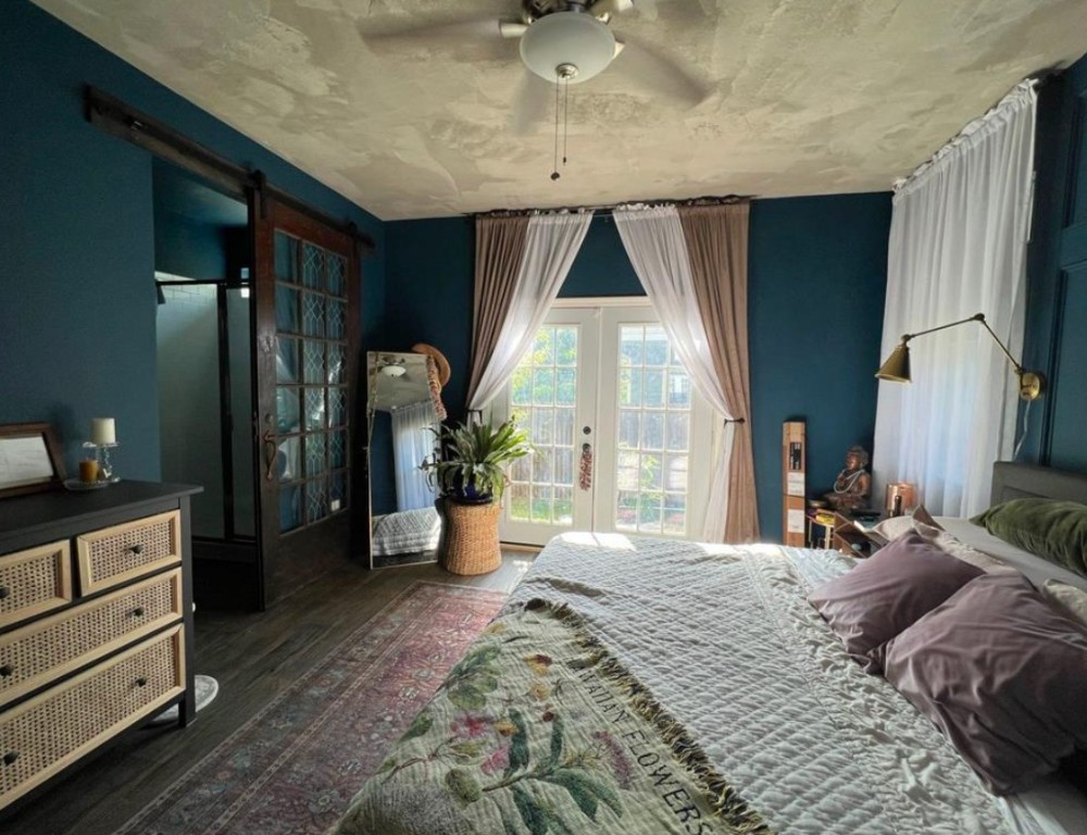 14110 Luisium View, Unit 72 Pflugerville, TX 78660 - Photo 7 of 21 a bedroom with a bed and large windows