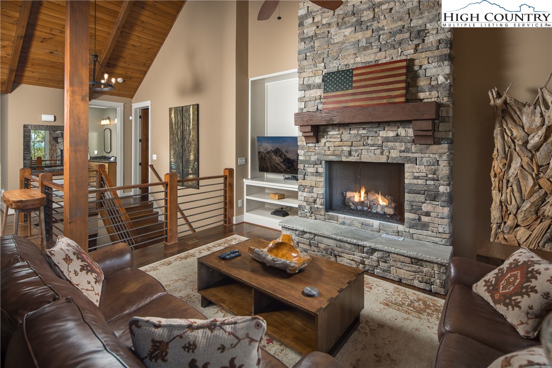 1253 Goldenrod Road Boone, NC 28607 - Photo 3 of 48 a living room with furniture and a fireplace