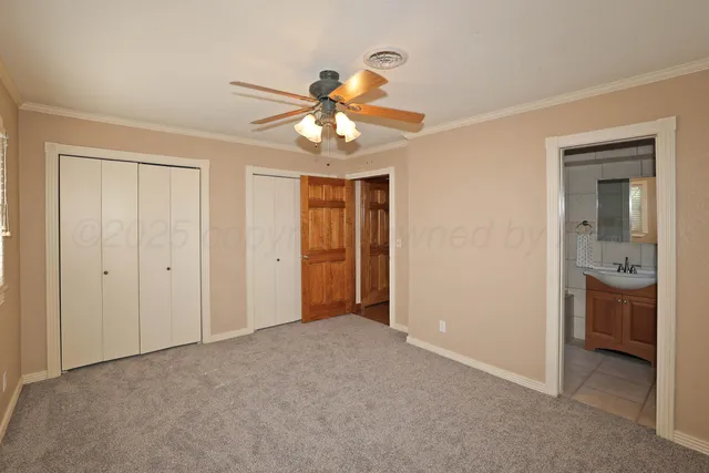 a white bath tub sitting next to a white sink