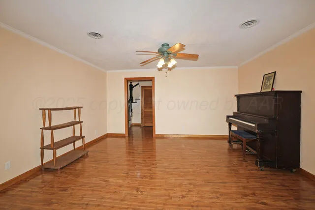 a view of livingroom with furniture and wooden floor