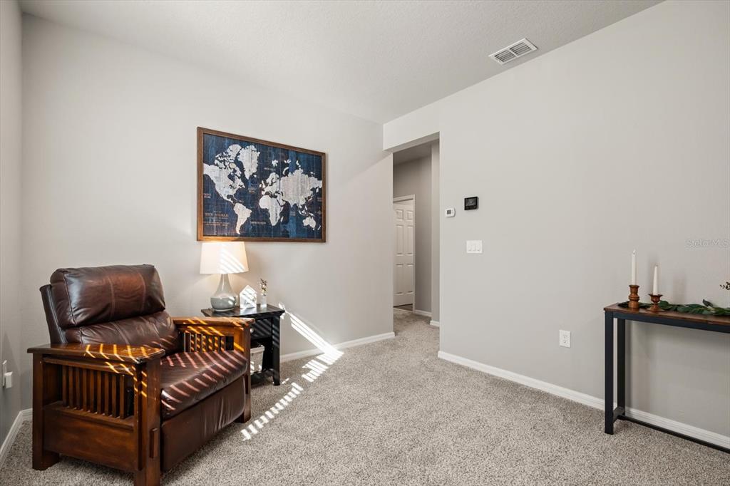 140 South Zuni Road St. Cloud, FL 34771 - Photo 15 of 35 a living room with furniture