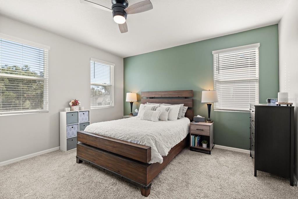 140 South Zuni Road St. Cloud, FL 34771 - Photo 17 of 35 a bedroom with a bed and a window