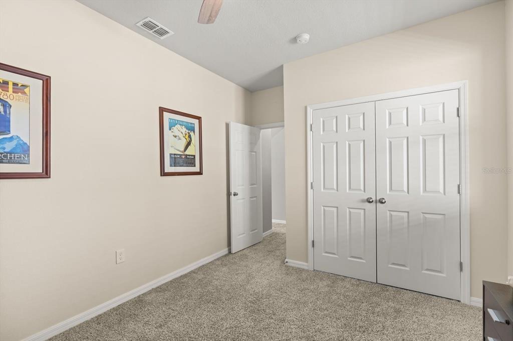 140 South Zuni Road St. Cloud, FL 34771 - Photo 22 of 35 an empty room with closet area