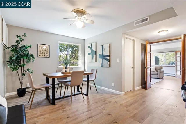 a kitchen with granite countertop cabinets and steel stainless steel appliances