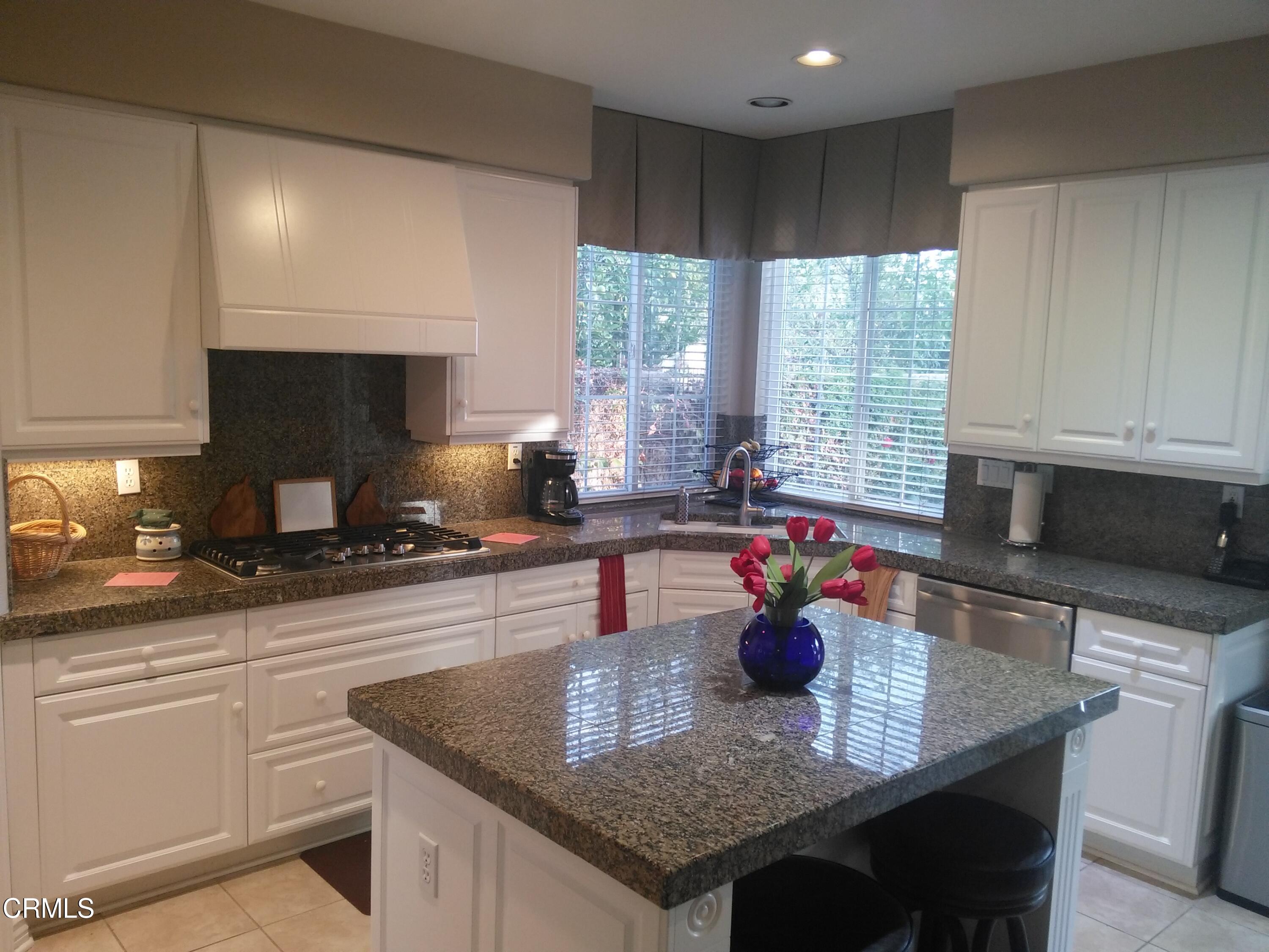 3502 Giddings Ranch Road Altadena, CA 91001 - Photo 12 of 33 a kitchen with granite countertop a sink a stove and cabinets