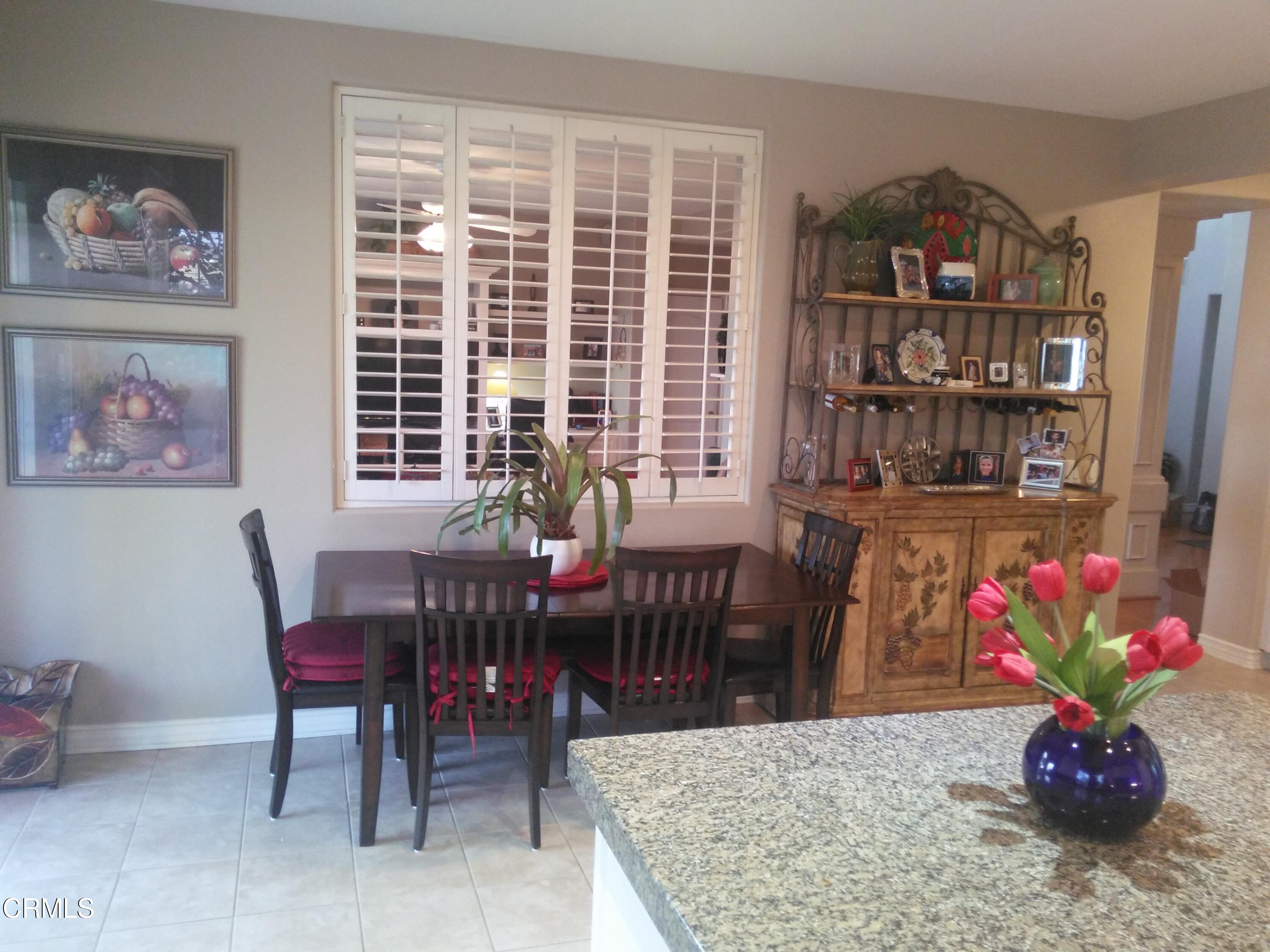 3502 Giddings Ranch Road Altadena, CA 91001 - Photo 15 of 33 a view of a dining room with furniture and a potted plant