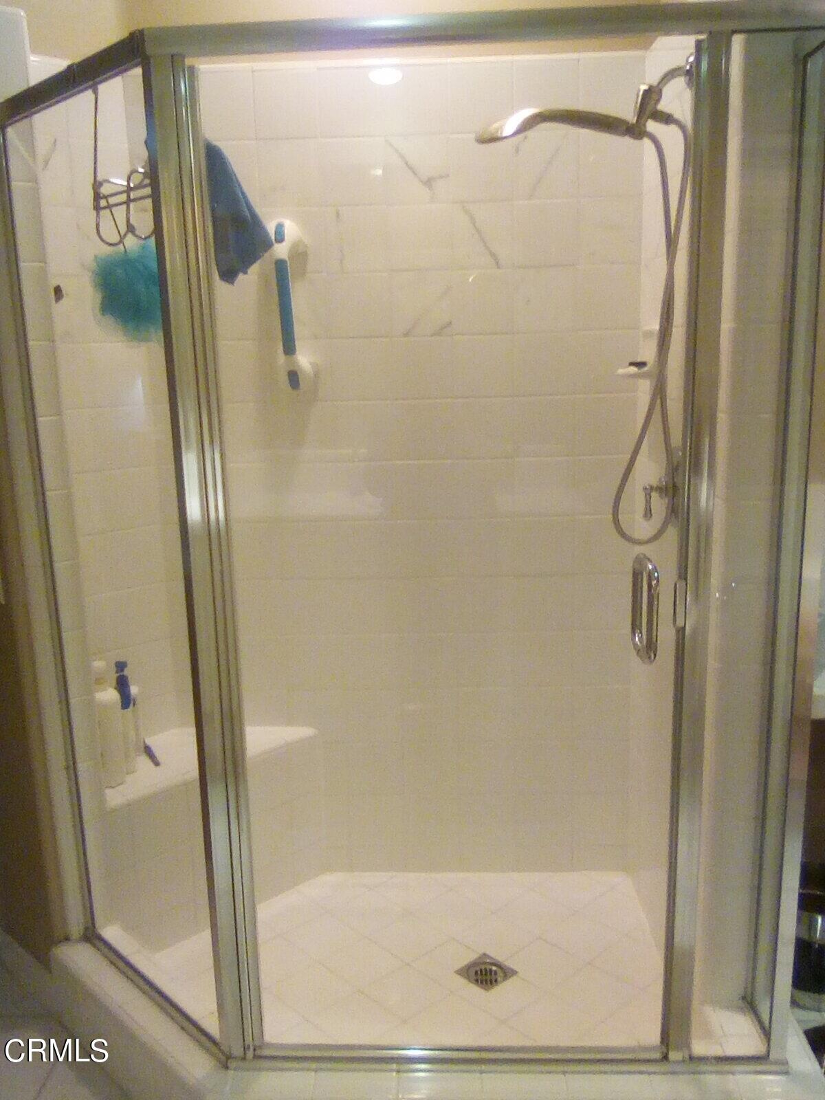 3502 Giddings Ranch Road Altadena, CA 91001 - Photo 19 of 33 a bathroom with a glass shower door