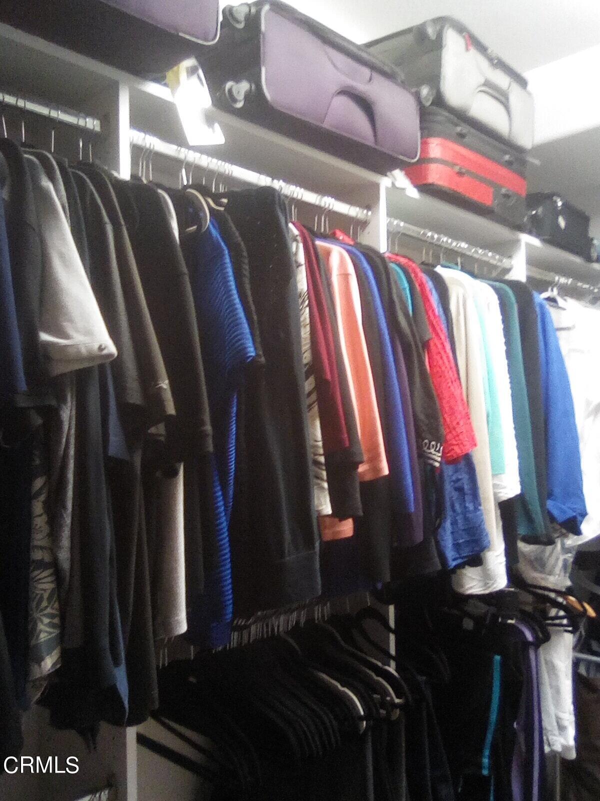 3502 Giddings Ranch Road Altadena, CA 91001 - Photo 21 of 33 a view of walk in closet with clothes and shoes