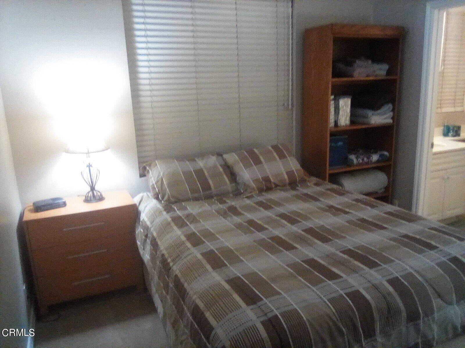 3502 Giddings Ranch Road Altadena, CA 91001 - Photo 23 of 33 a bedroom with a bed and a window