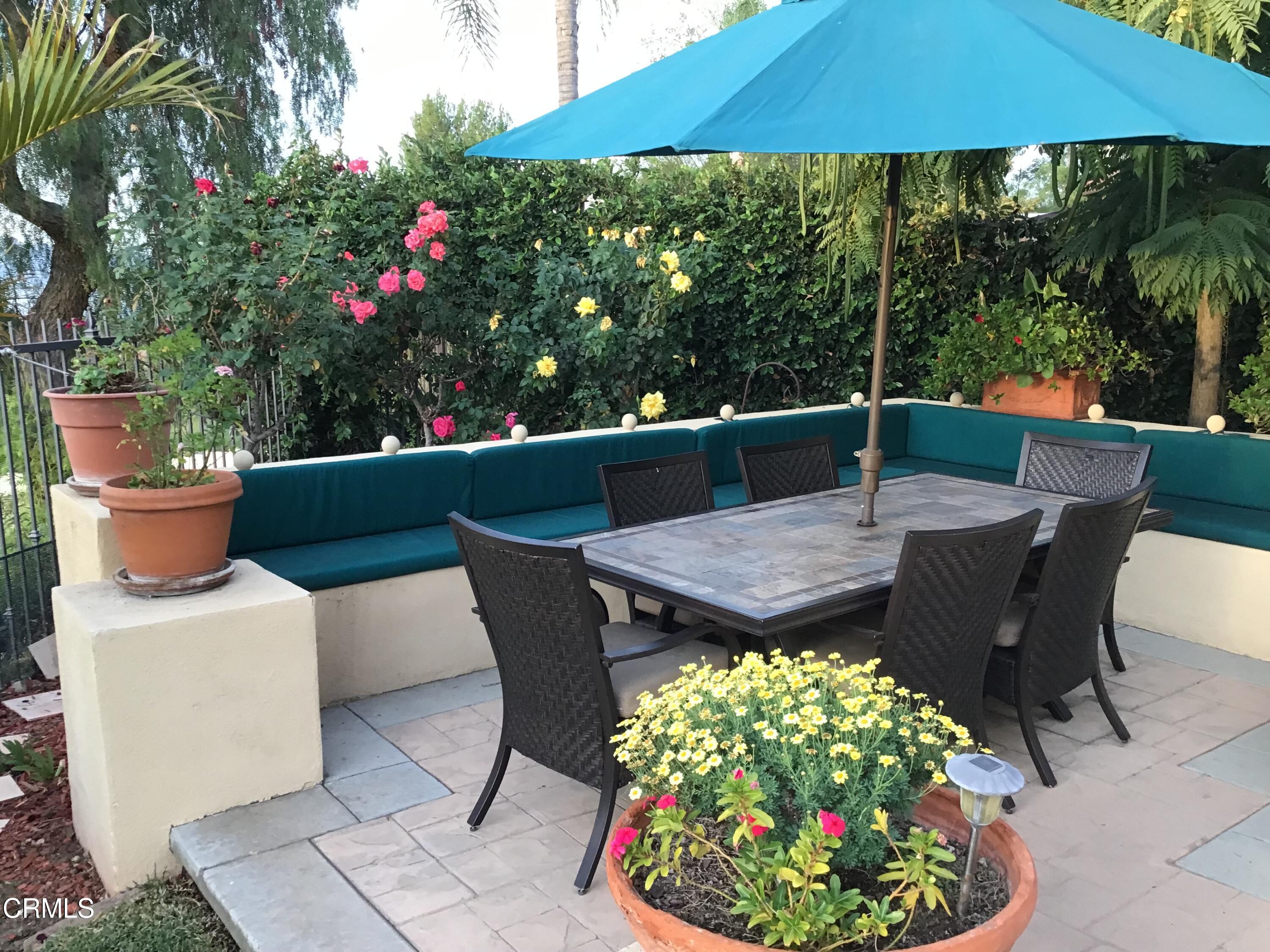 3502 Giddings Ranch Road Altadena, CA 91001 - Photo 28 of 33 a view of a table and chairs in patio