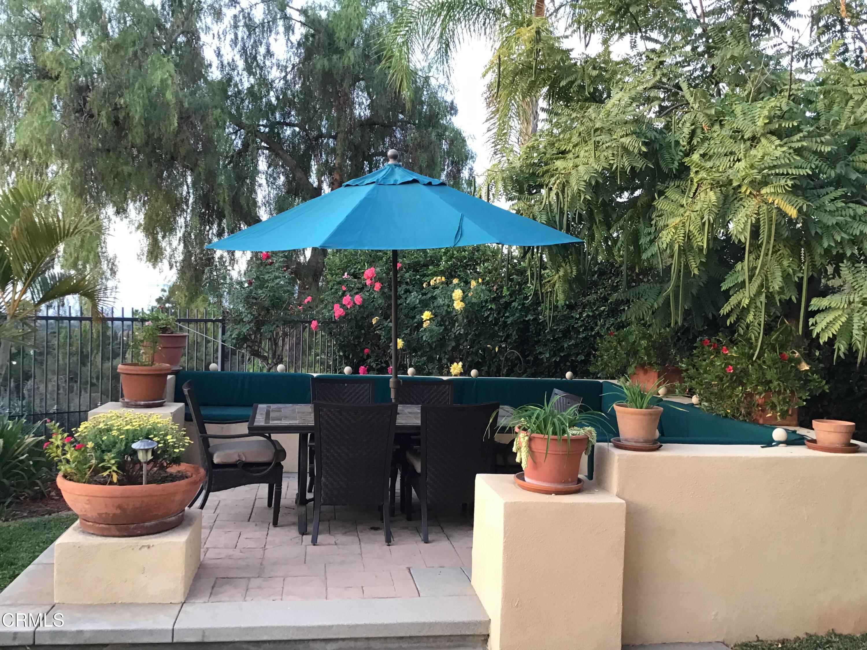 3502 Giddings Ranch Road Altadena, CA 91001 - Photo 30 of 33 a view of a table and chairs under an umbrella