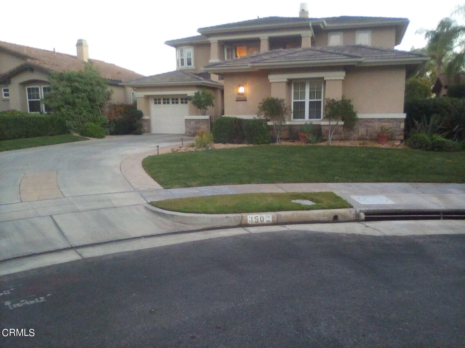 3502 Giddings Ranch Road Altadena, CA 91001 - Photo 3 of 33 a front view of a house with a yard and garage