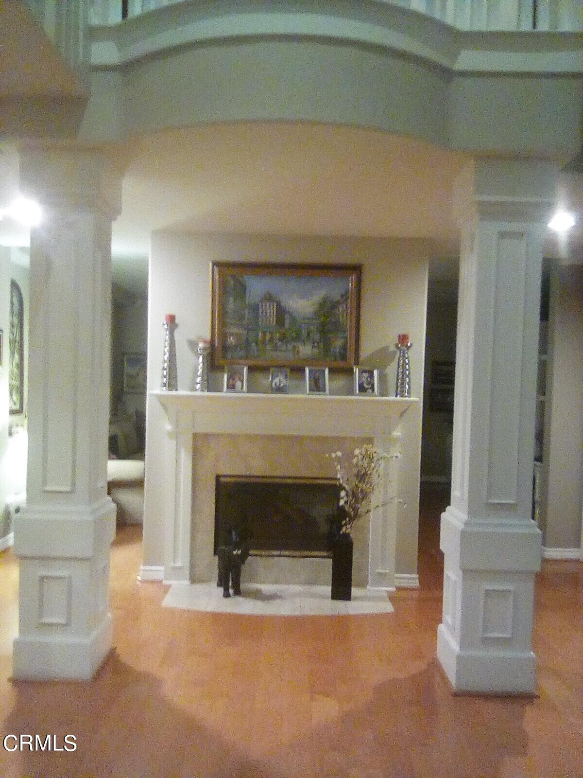 3502 Giddings Ranch Road Altadena, CA 91001 - Photo 5 of 33 a living room with a fireplace and a counter top space