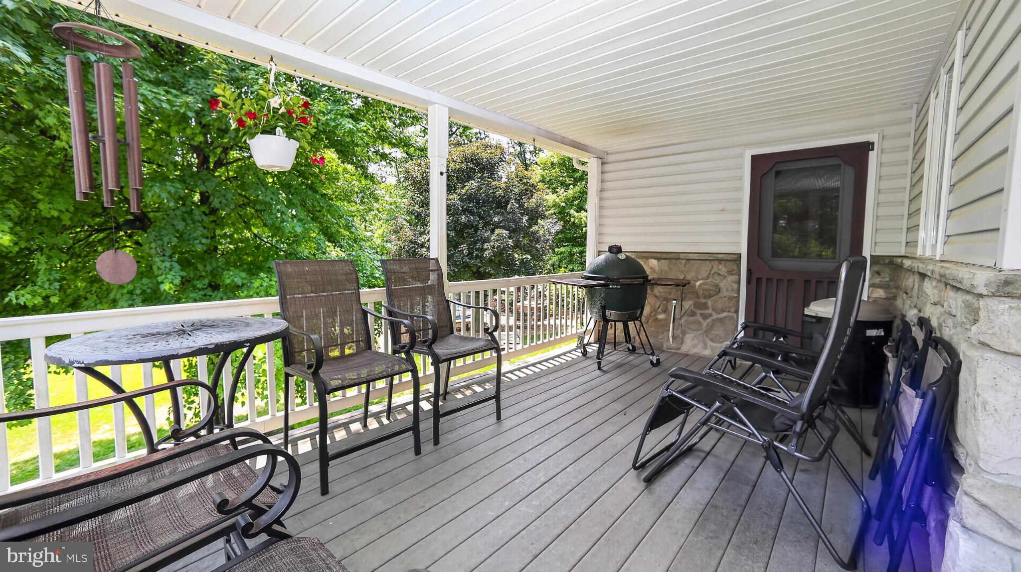 257 Hill Road New Holland, PA 17557 - Photo 84 of 94 Serene porch with lush green views.