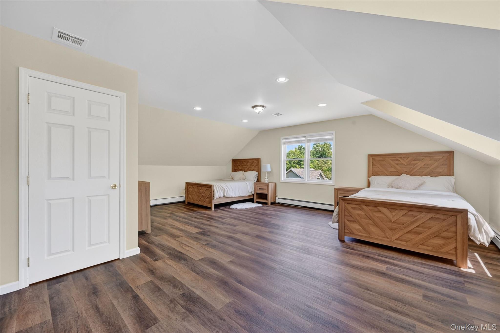 19 Bull Mine Road Chester, NY 10918 - Photo 32 of 42 Spacious room featuring wood-finish flooring, recessed lighting, a multi-pane window, and light-toned walls