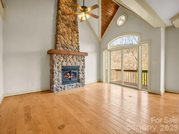 a view of kitchen with furniture and fireplace