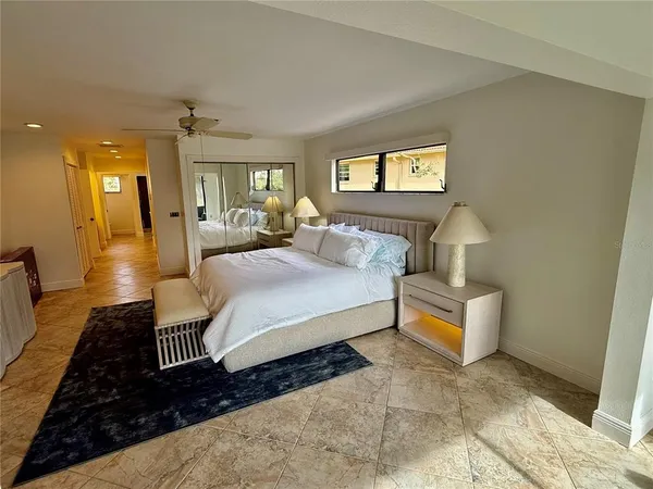 a room with a sink and a mirror