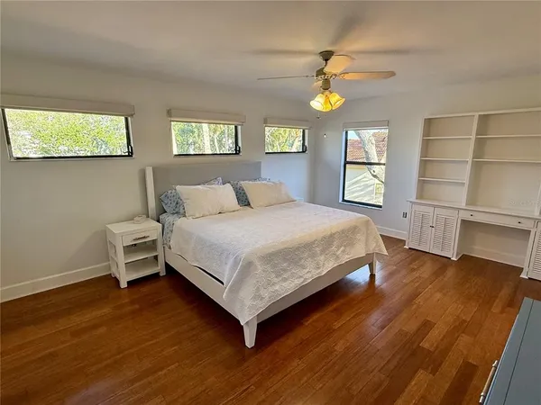 a bathroom with a toilet and shower