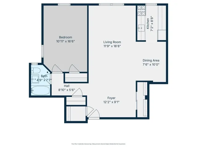 a bathroom with a sink mirror vanity and toilet