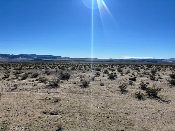 a view of lake and mountain
