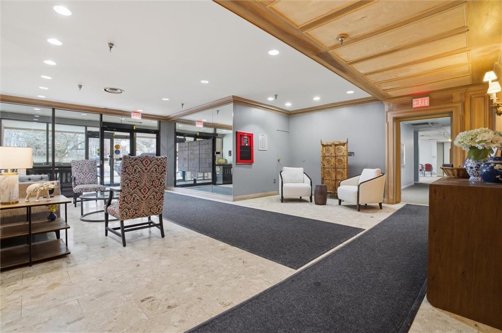 5715 Beacon Street, Unit 107 Pittsburgh, PA 15217 - Photo 7 of 50 a living room with furniture and a table