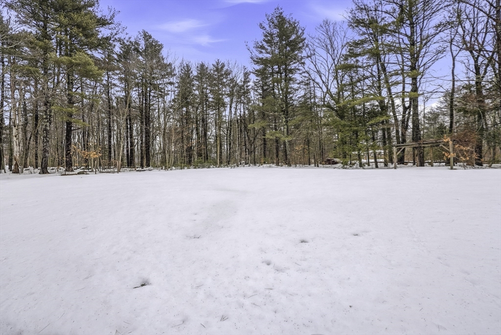 300 West Main Street Hopkinton, MA 01748 - Photo 19 of 26 a street view covered with snow in front of house