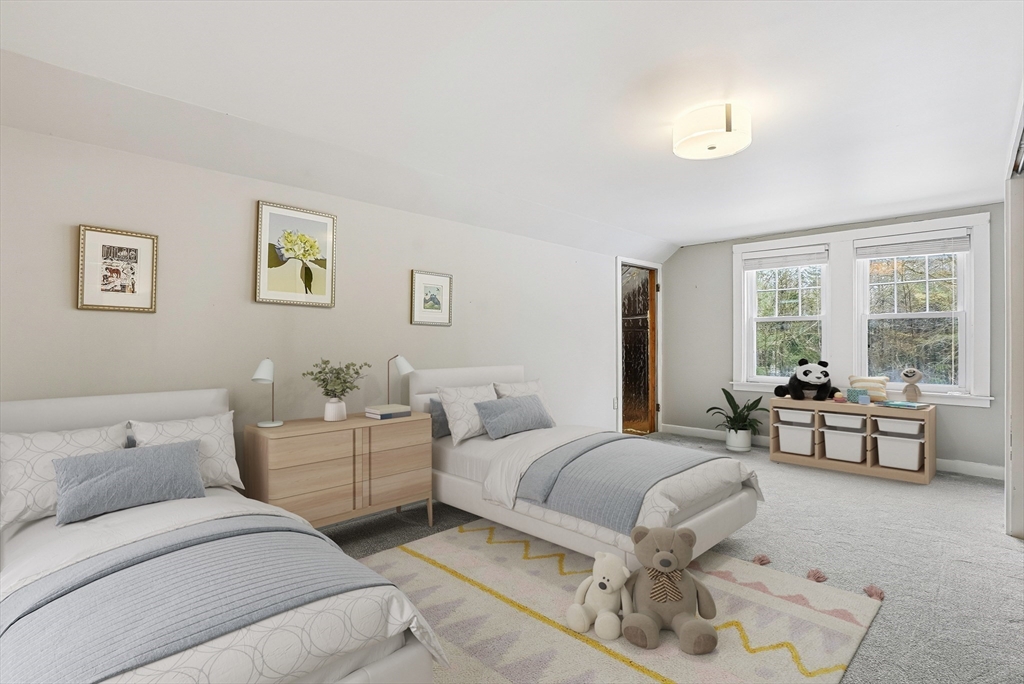 300 West Main Street Hopkinton, MA 01748 - Photo 20 of 28 a bed room with two bed and a large window